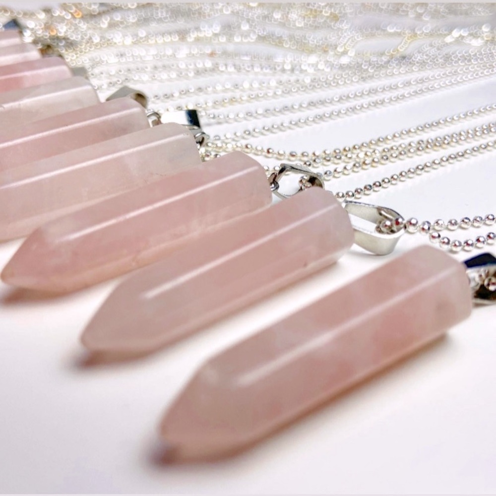 Rose quartz necklace on silver ball chain.